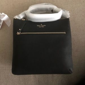 Brand new Kate Spade purse with tags still on it. Never used!